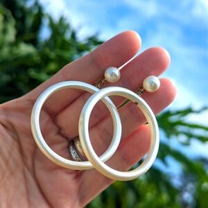 Pearly plastic ivory colored hoop screw backs